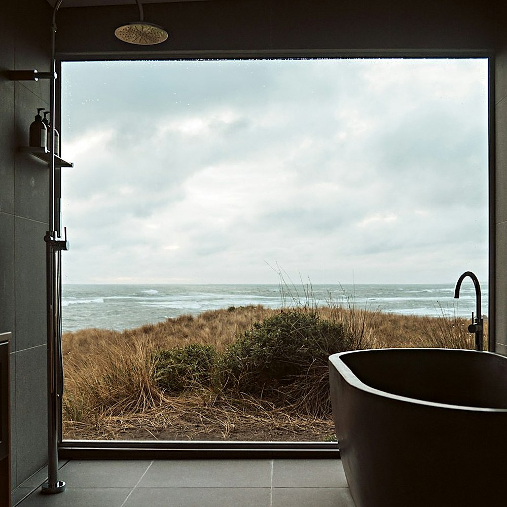 Coastal style bathroom designed by Next Level Design
