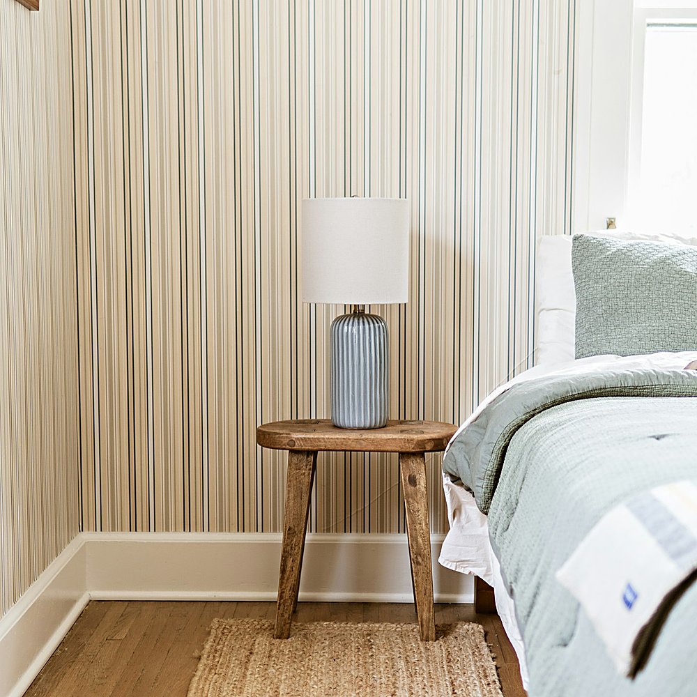 Coastal style bedroom designed by Next Level Design