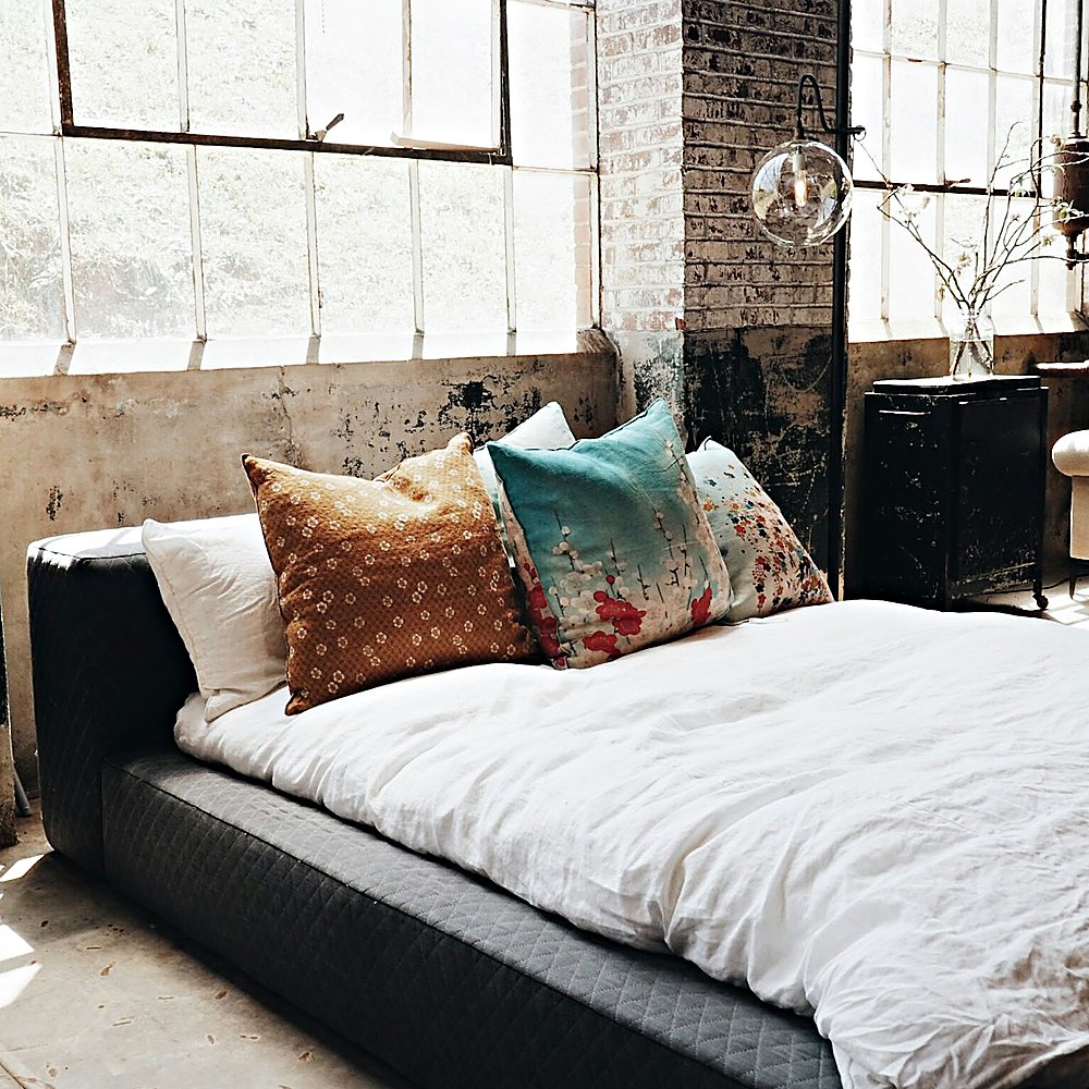 Industrial style bedroom designed by Next Level Design