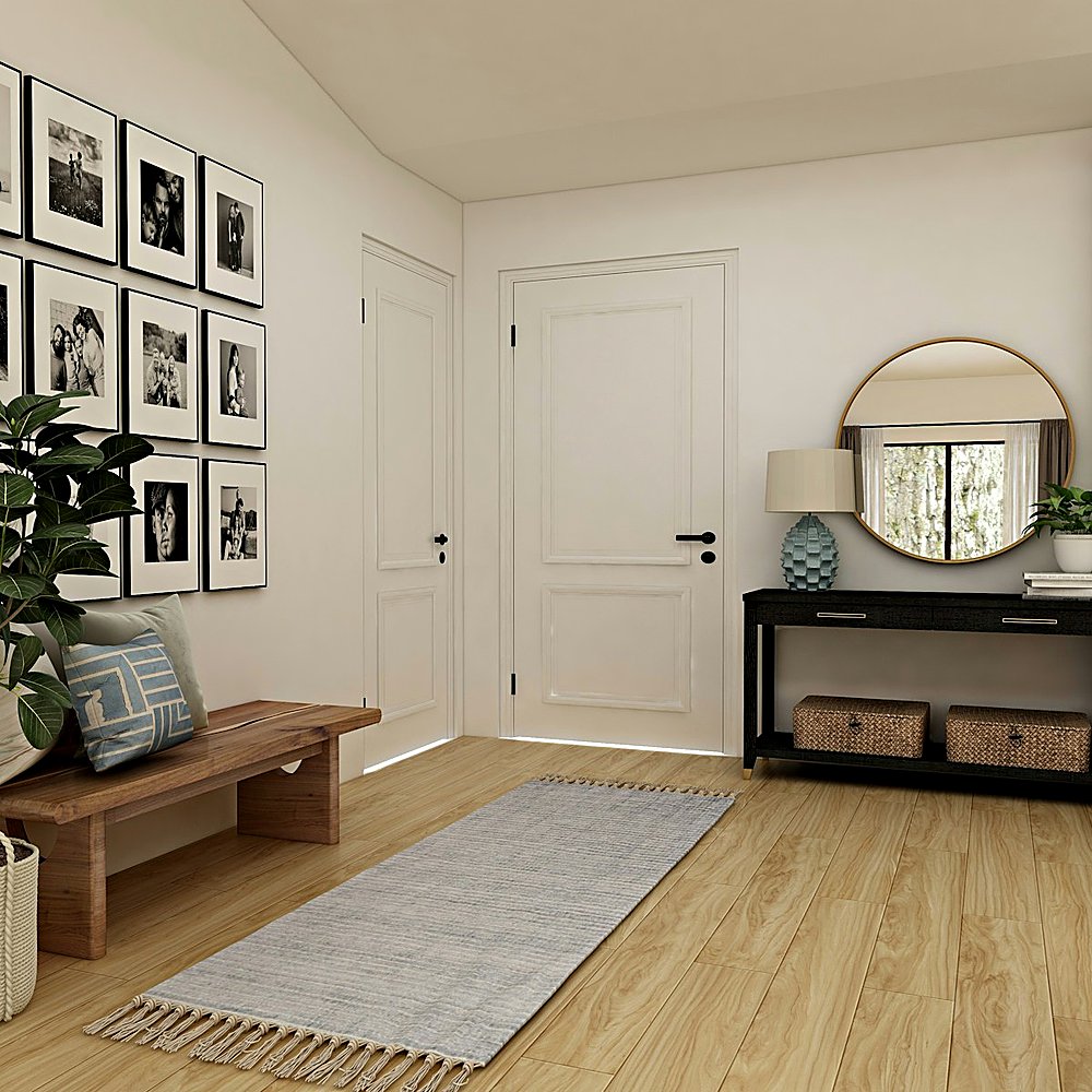 Warm Modern style entryway designed by Next Level Design